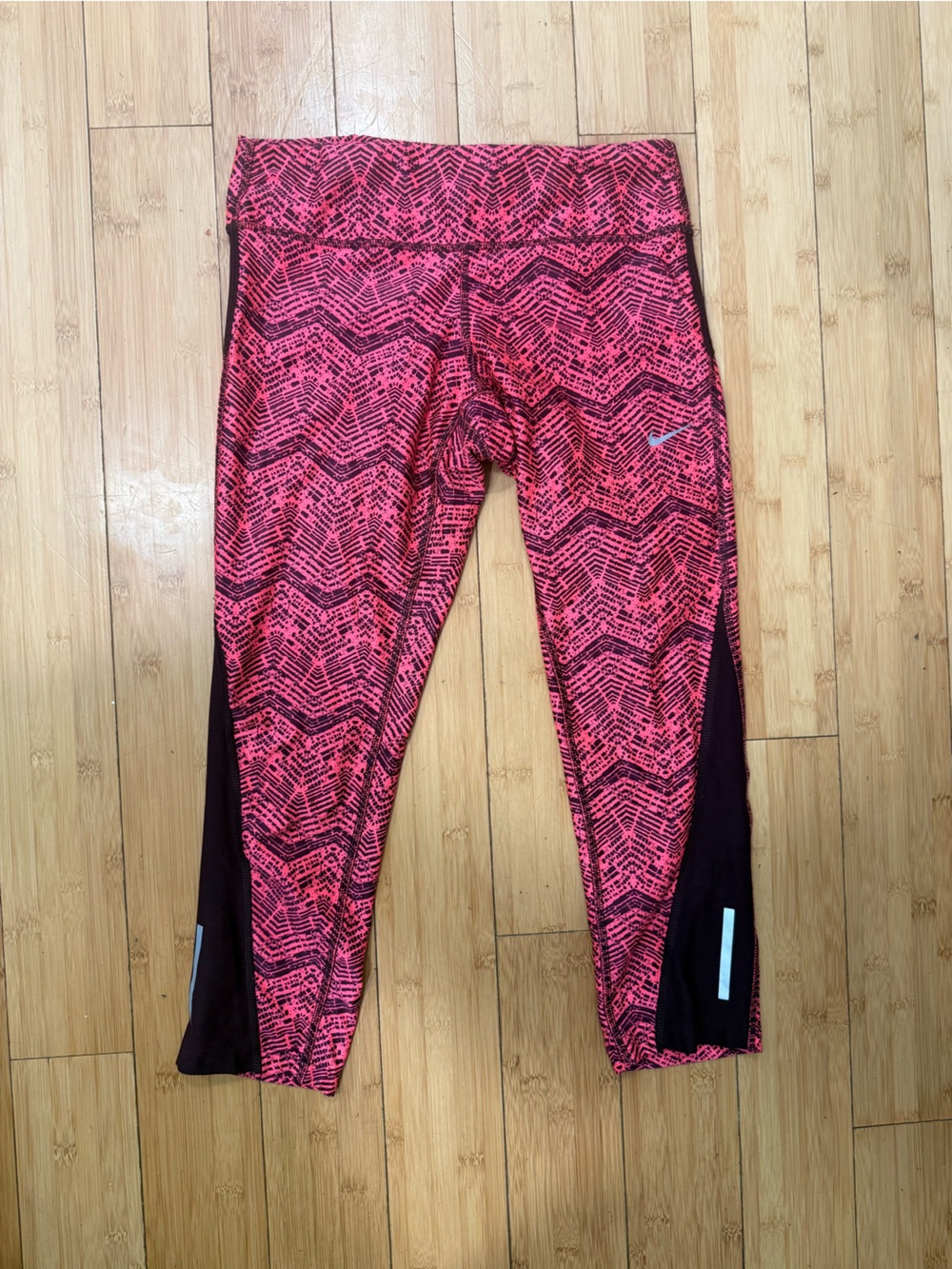 Nike Women's Pink Patterned Leggings with Maroon Side Panels
